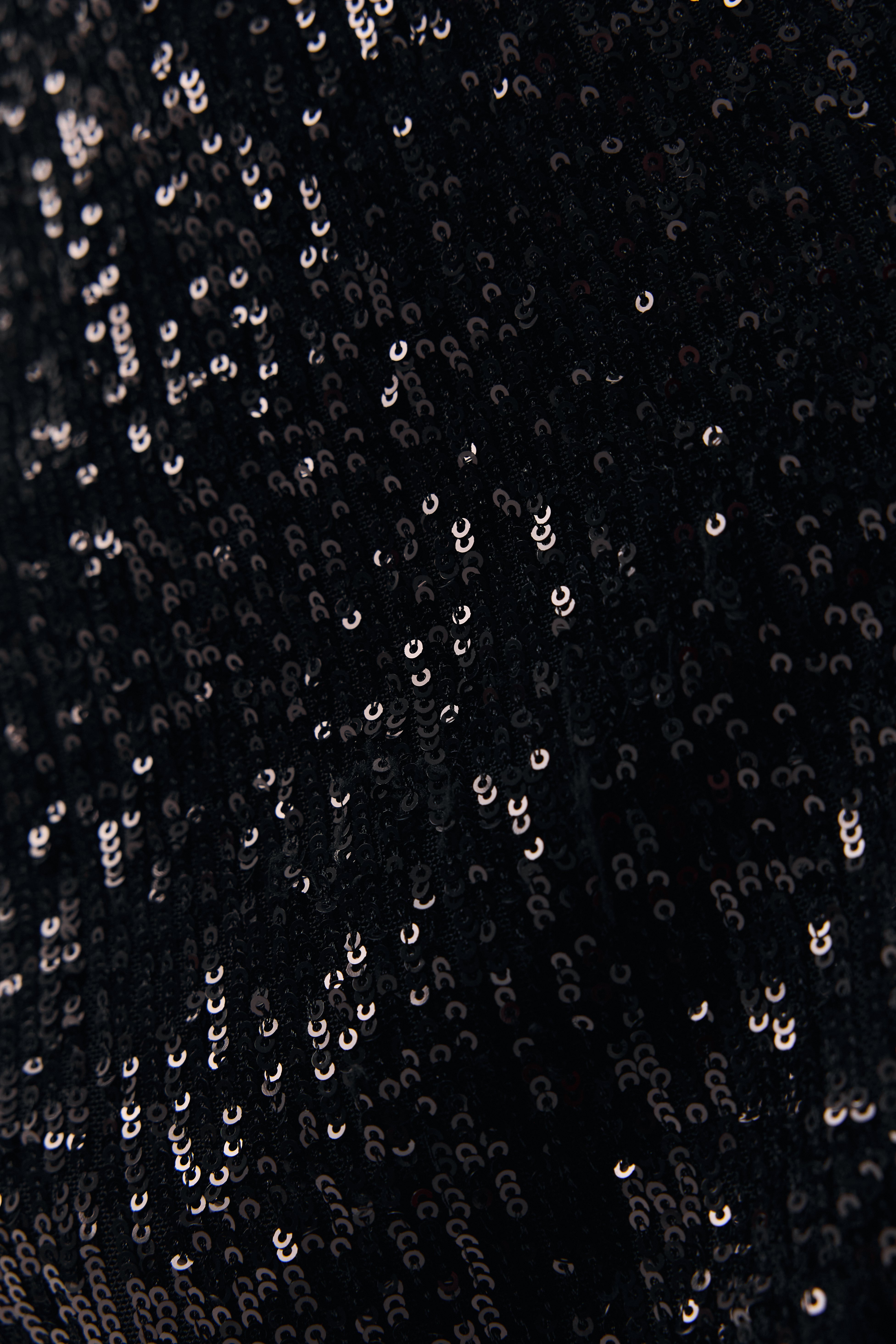 Штани із паєтками