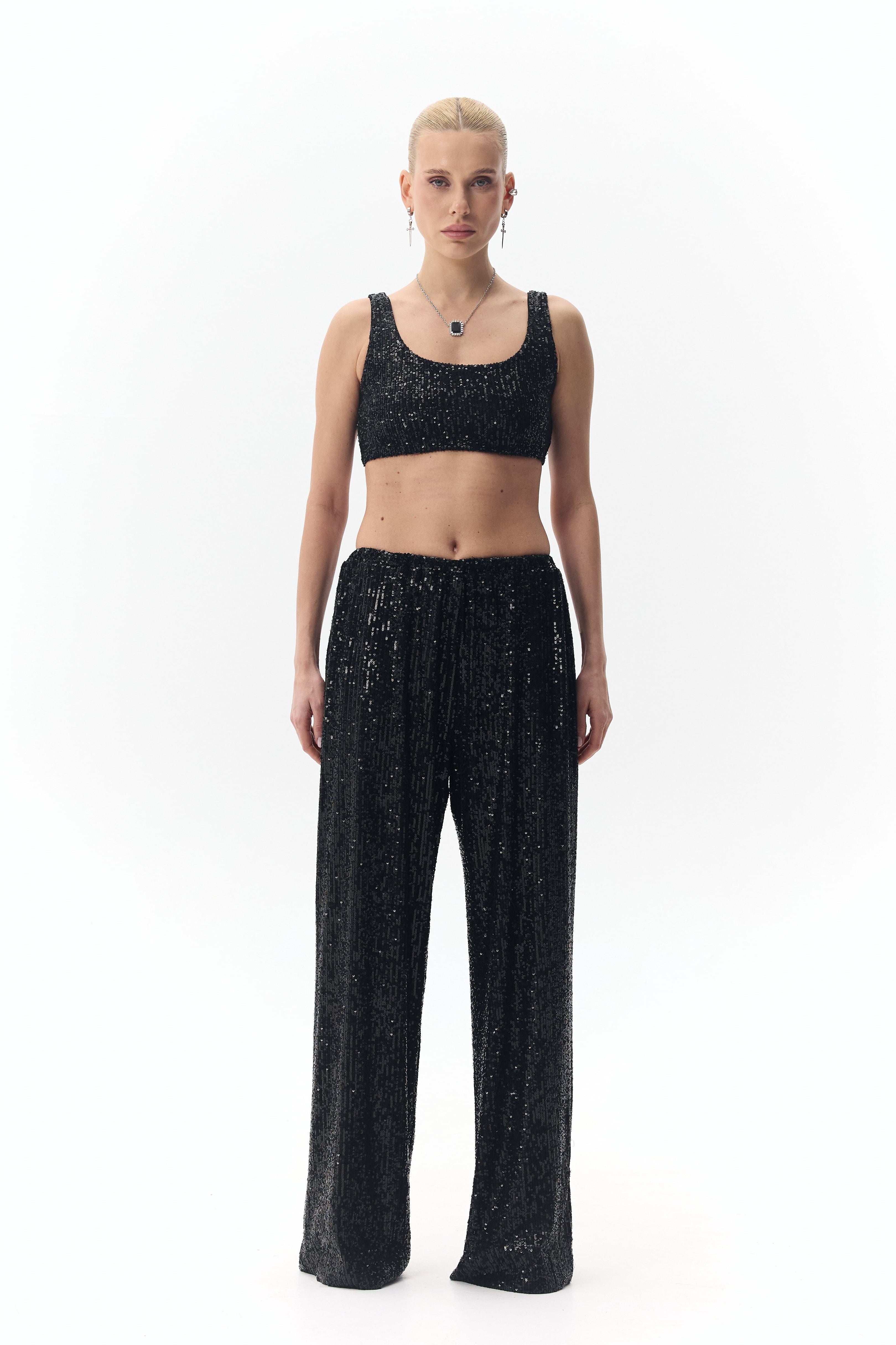 Штани із паєтками