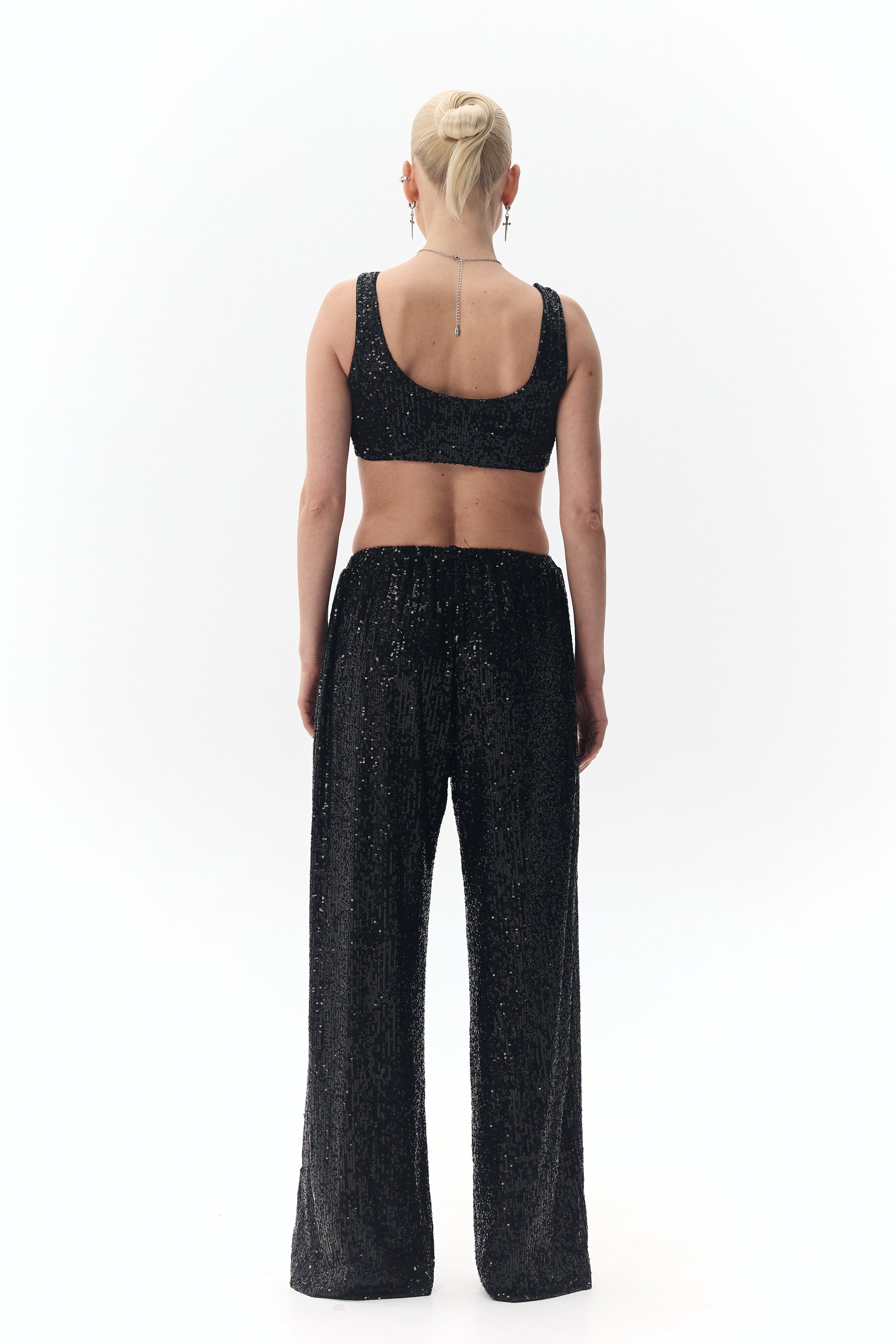 Штани із паєтками